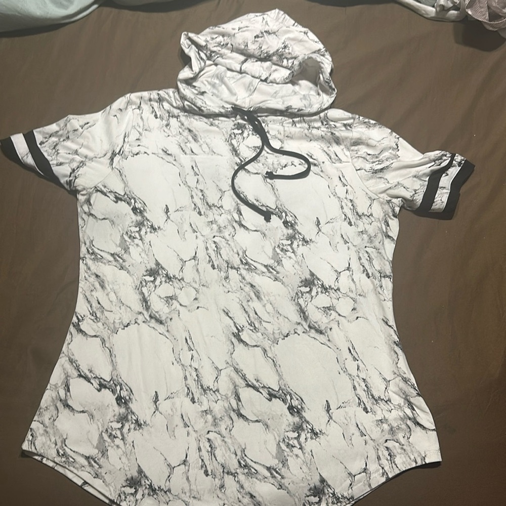 Hooded fashion tee with black striped arm.